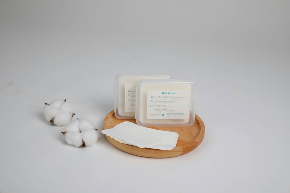 Soft-focus photo of natural ingredients and scented pads on a marble vanity